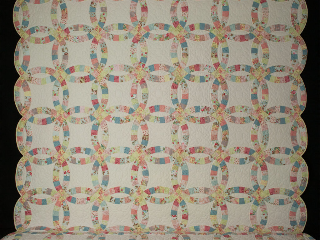 King Pastels Double Wedding Ring Quilt