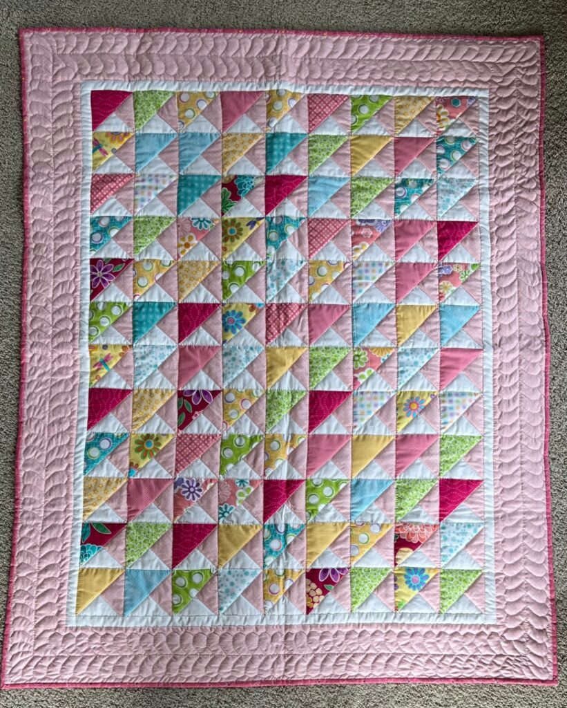Clippings Crib Quilt for baby girl