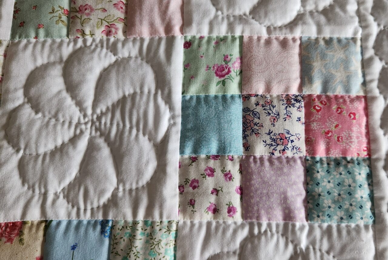 Pastel and White Nine Patch Crib Quilt (Pink Binding) - Image 3