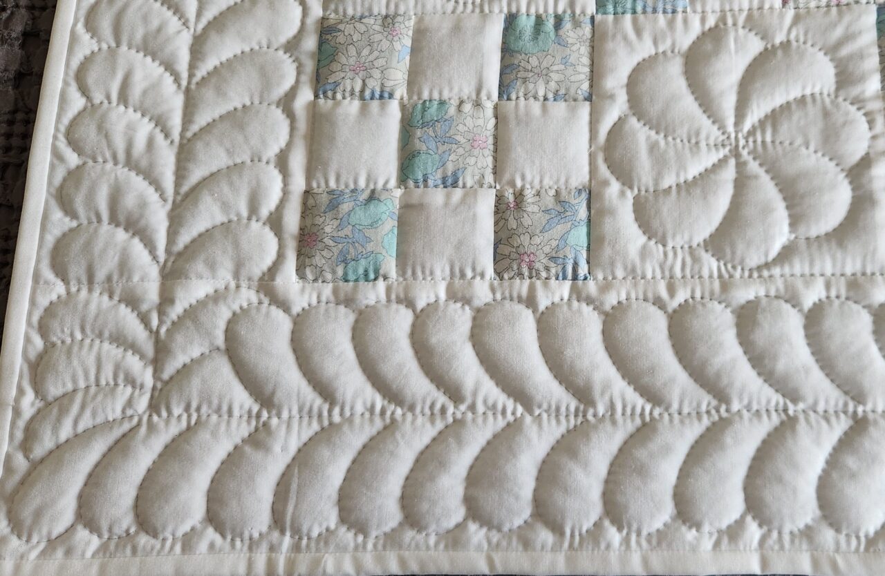Vintage Floral and White Nine Patch Crib Quilt - Image 2