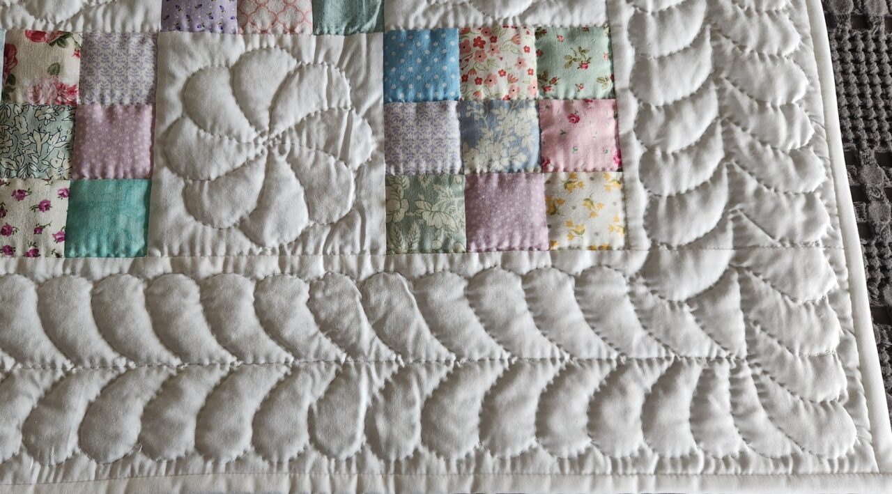 Pastel and White Nine Patch Crib Quilt (White Binding) - Image 2