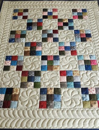 Tan and Multi-Color Nine Patch Quilt