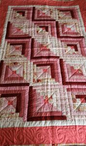 Vintage Fabrics Coral and Cream Log Cabin Quilt