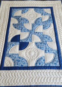 Blue and White Solomon's Puzzle Crib Quilt