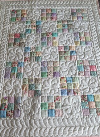 Pastel and White Nine Patch Crib Quilt (Pink Binding)