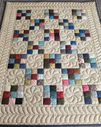 Tan and Multi-Color Nine Patch Quilt